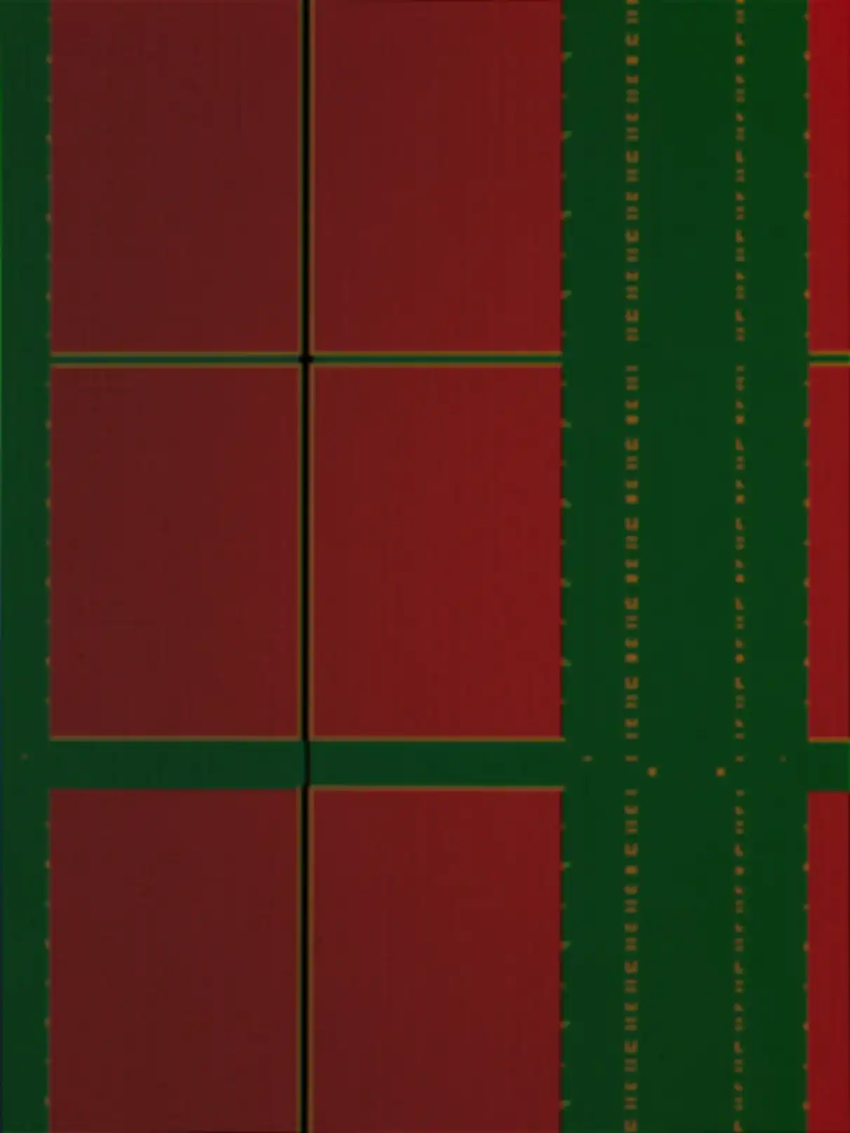 A red-and-green, pixelated PCB pattern on a black background.