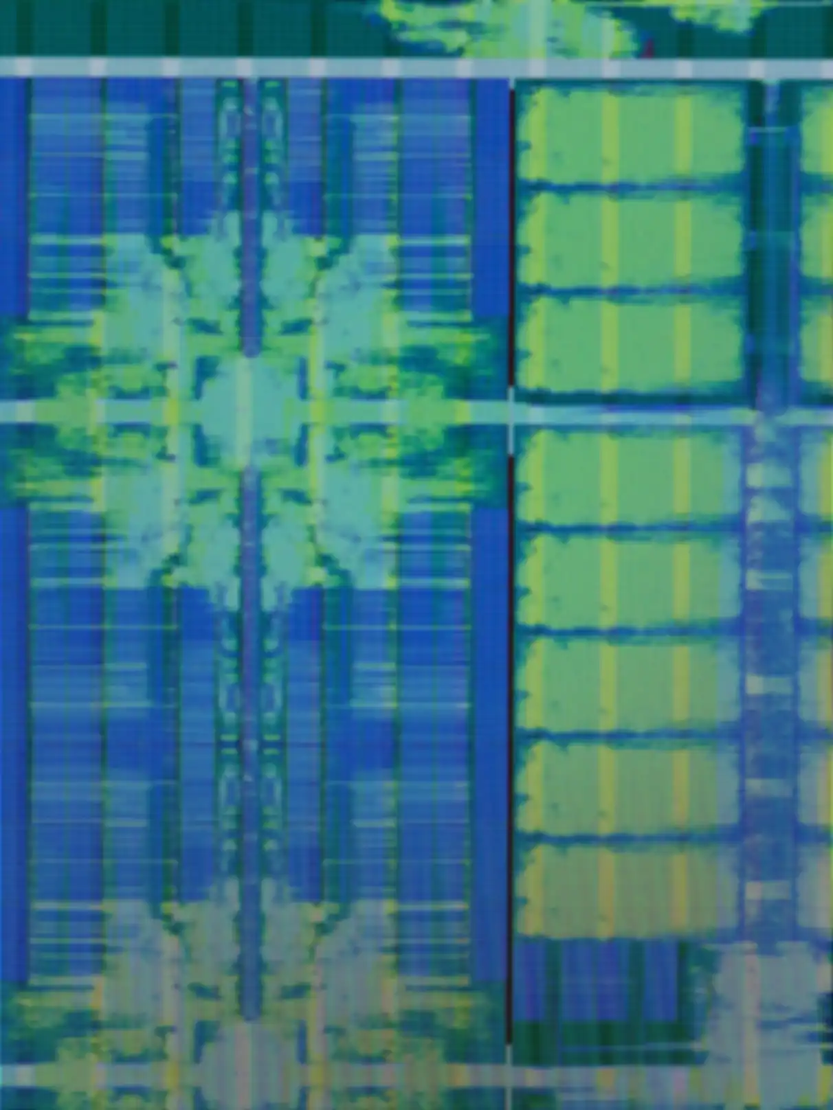 A green-and-blue, pixelated circuit board pattern on a black background